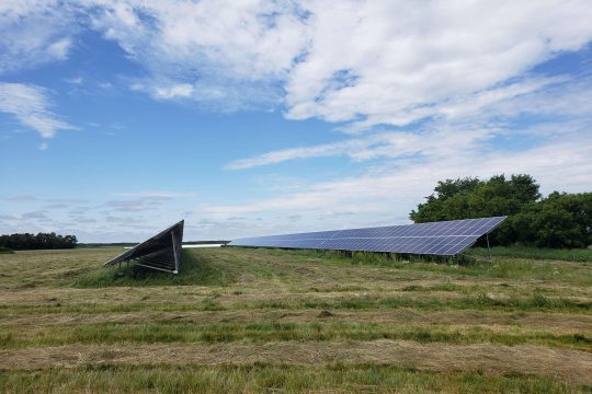 solar panels outside on the grass field
